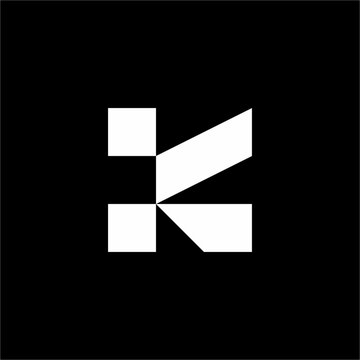Abstract letter K logo blending a grid-like stem with dynamic diagonal bars. Unique & elegant mark suited for fintech, software engineering, architecture, AI labs, and Web3.