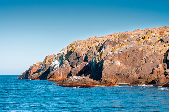 sea coast of bulgaria. travel background for summer vacations in europe. rock shore of st. peter island in evening light
