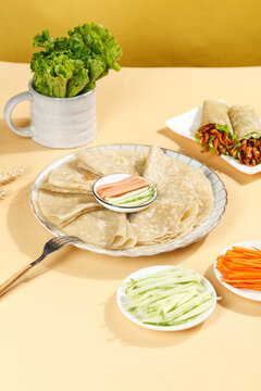 Thin Buckwheat Pancakes with Fresh Vegetables Healthy Breakfast Setup on Wooden Table