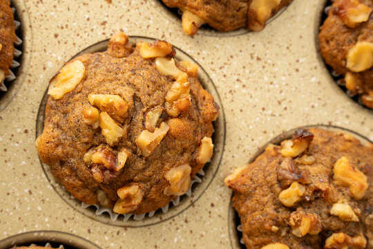 Banana muffins in a muffin pan 