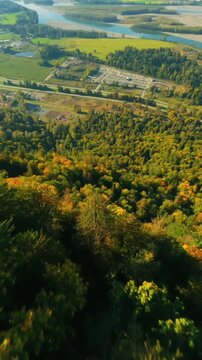 Flight along the mountain range by FPV Drone, Fraser river valley below. Canada