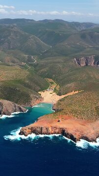 Aerial view on Cala Domestica Beach and landscape around. Sardinia, Italy
