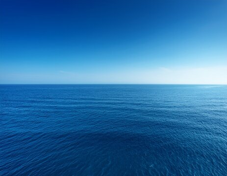 vast blue ocean and a cloudless sky with room for text