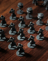 Fototapeta premium Imperial army miniatures assembled on a Battle of Hoth tabletop battlefield featuring AT AT walkers, scout droids and infantry captured with dramatic lighting in a cinematic perspective