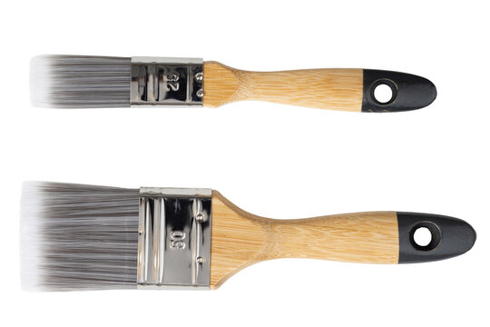 two paintbrushes with wooden handle cut out