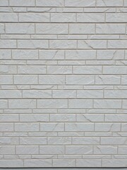 Fototapeta premium White stone textured siding wall background