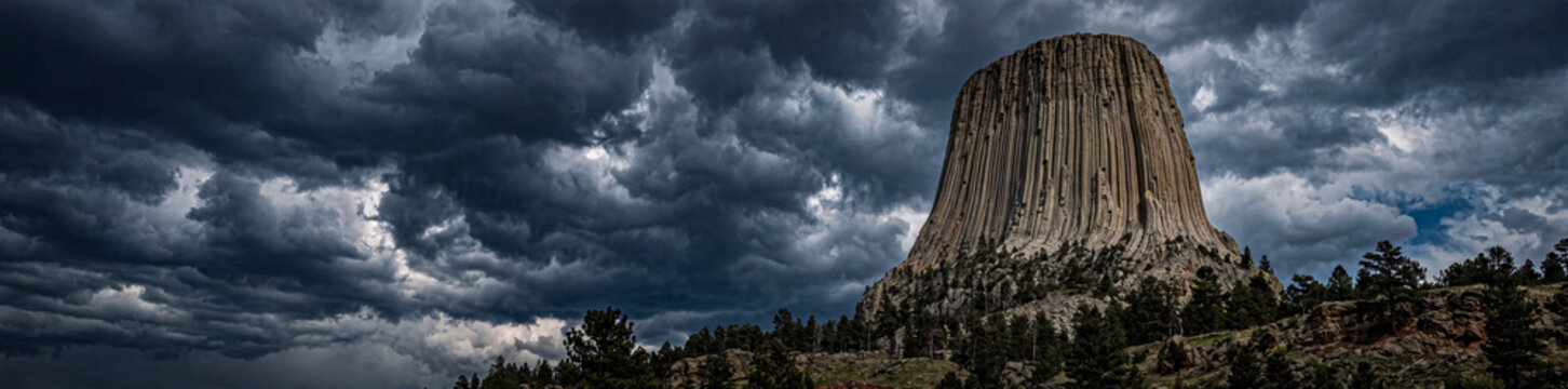 devils tower storm clouds in the sky