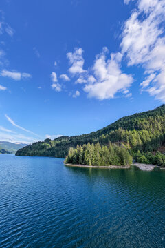 Blue Lake and Evergreen Forest at Harrison Lake Near Harrison Hot Springs, British Columbia, Canada