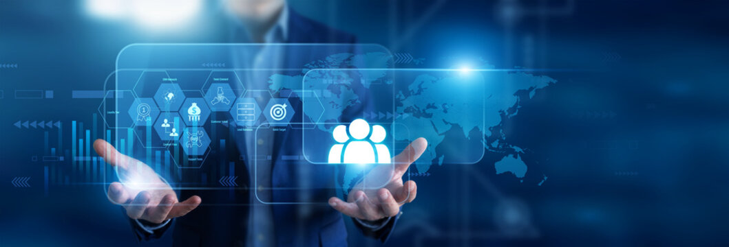 CRM specialist holding in hands client portfolio reports. Sales manager using virtual screen tracking customer interaction pipelines and retention lifecycle metrics. Enterprise CRM.