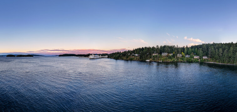 Swartz Bay Ferry Terminal At Sunset Over Coastal Waters Near Victoria, Vancouver Island, British Columbia