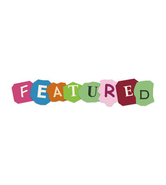 Featured word written on colorful torn paper scraps