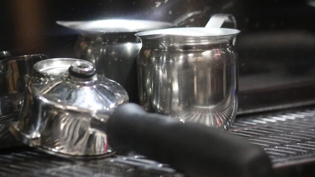 Tracking shot around coffee shot puller machine