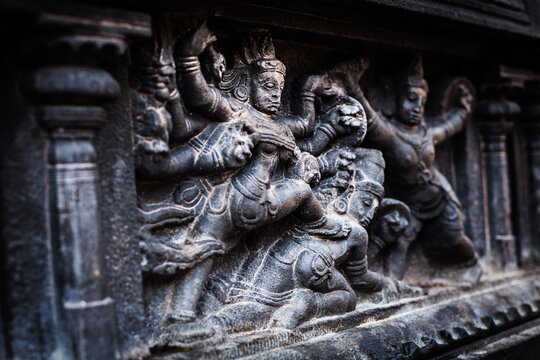 A bas relief depicting Durga slaying demon (Maheeshasuramardini). Brihadishwara Temple. Tanjore (Thanjavur), Tamil Nadu, India. The Greatest of Great Living Chola Temples - UNESCO World Heritage Site