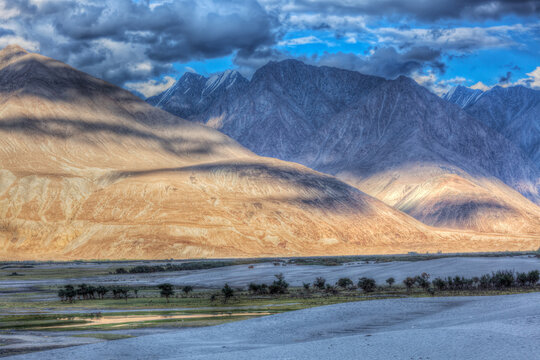 High dynamic range view valley in Himalayas. with sand dunes. Hunder, Nubra valley, Ladakh, India