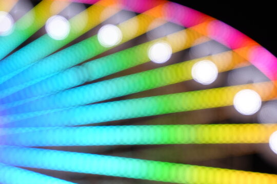 Abstract background lights of a ferris wheel at the fair