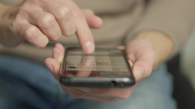 Person navigates smartphone interface, highlighting tactile experience digital communication. Emphasizes connectivity, convenience, role mobile devices in daily routines