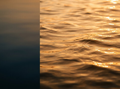 Fondo de agua con reflejo dorado al atardecer y espacio c&aacute;lido para texto