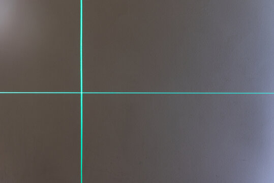 green lines on a wall, made by a laser level mounted