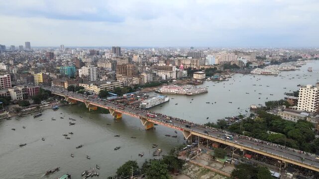 Busy Babu Bazar Bridge Crossing the Buriganga River with Sadarghat River Port, Dhaka, Bangladesh