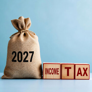 2027 income tax payment with burlap money sack. Financial planning concept using cash bag for tax season budgeting and savings.