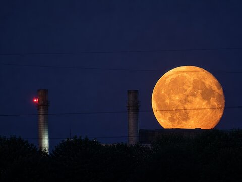 Moonrise Between Industrial Chimneys
