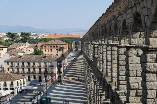 Segovia, spain; 07 25 2026 roman aqueduct of segovia arches casting long shadows