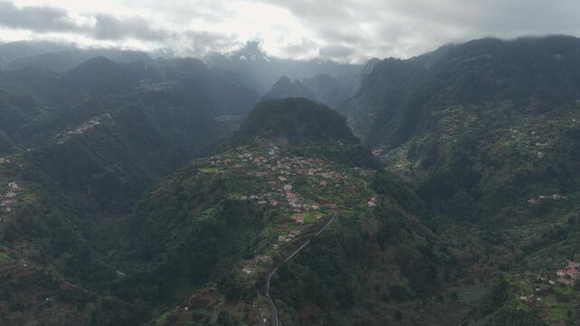 Panoramic aerial view of S&atilde;o Roque do Faial surrounded by Madeira's dramatic mountain valleys