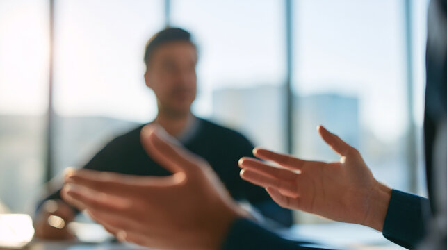 Blurred Registration Consultation with Government Representative and Applicant in Modern Office