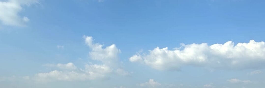 Cloudscape, Timelapse of Wide Panoramic Blue Sky Background with Cumulus Cloud Band for Banner and Header