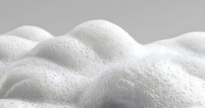 The foam produced by white soap is accompanied by suds from detergent or shampoo.