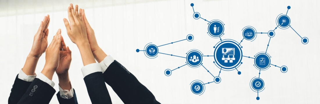 This image captures a group of professionals with hands raised in celebration, surrounded by icons symbolizing management concepts, highlighting teamwork and collaborative success. Amity