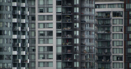 Naklejka premium Windows and Balconies in Dense Urban Apartment Towers