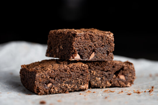 chocolate brownies on a dark background