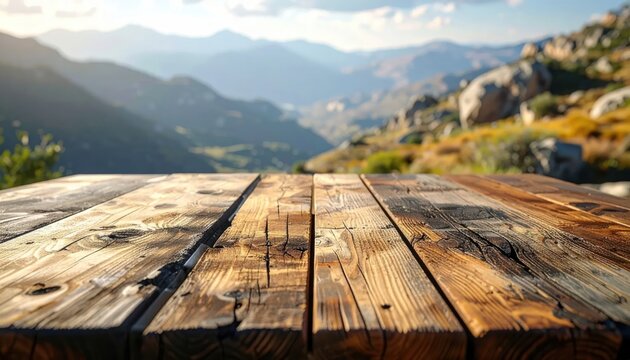 Rustic Wooden Table with Scenic Mountain Landscape Background at Sunrise.