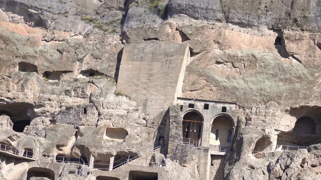 Vardzia cave monastery carved into Erusheti Mountain cliffs in Georgia, a historical 12th-century medieval landmark of Europe