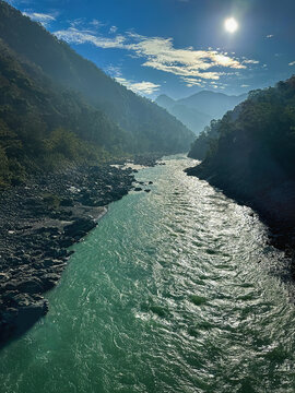 Ganges River Flowing Through Rishikesh with Himalayan Mountains, Uttarakhand, India