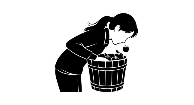 Young woman playing apple bobbing game at a halloween party