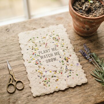 Handmade Seed Paper Card with Lavender and Scissors on Wooden Table.