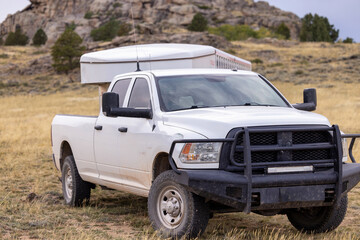 White  Ranch Pickup Truck pulling a stock horse livestock trailer  © Terri Cage 