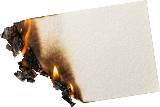 A single sheet of textured white paper is burning along one edge showing bright orange flames and charred black ash consuming the delicate material in a dramatic display of destruction
