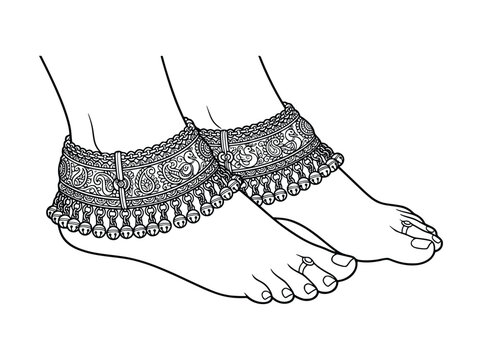 Feet wearing traditional Indian jewelry anklets and toe rings