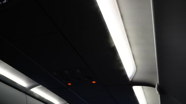 strong cold wind and fog from air conditioner of an airplane because of hot weather