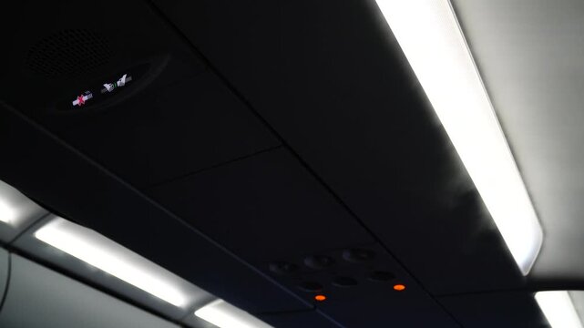 strong cold wind and fog from air conditioner of an airplane because of hot weather