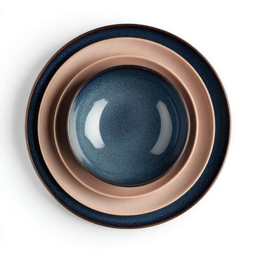 Three round ceramic serving pieces with a concentric arrangement, featuring varying colors and textures on a stark white background