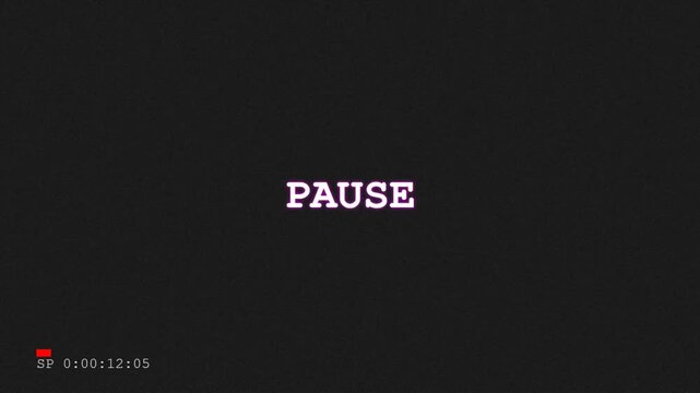 Vintage VHS tape pause screen with retro font and timecode display.