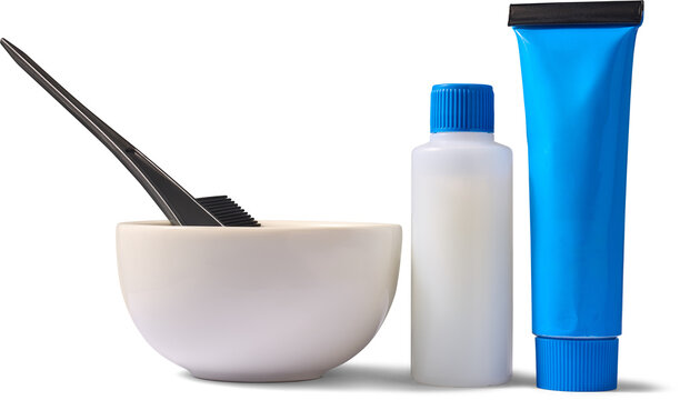 hair dye kit isolated white background, mixing bowl with brush and blue color tube with developer bottle, salon equipment in side view