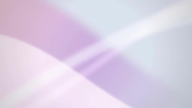 Soft pastel light shapes and gradients shift in a seamless loop