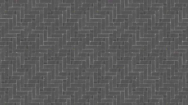 Contemporary dark grey paving stones herringbone pattern, seamless loop.