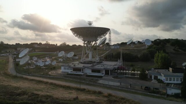 Aerial view of satellite dish antennas at a rural ground station