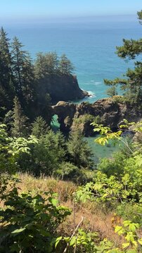 Natural Bridges in Brookings, Oregon, as seen from scenic viewpoint, on a summer day.